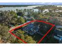 Aerial view of property showing house and surrounding land at 635 Butler St, Windermere, FL 34786