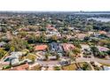 Aerial view showcasing a house's location in a residential neighborhood at 9217 Hidden Bay Ln, Orlando, FL 32819