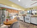 Bright kitchen with stainless steel appliances at 5715 Se 109Th St, Belleview, FL 34420