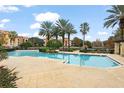 Resort-style community pool with ample lounge space at 6119 Metrowest Blvd # 106, Orlando, FL 32835