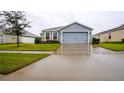 Front view of a single-Gathering house at 1080 Condor Dr, Haines City, FL 33844