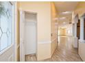 Spacious entryway with a coat closet and view into the living area at 9076 Sw 95Th Ave # 9076, Ocala, FL 34481