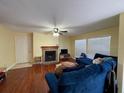 Living room with fireplace and hardwood floors at 650 Youngstown Pkwy # 215, Altamonte Springs, FL 32714