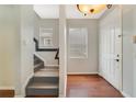 Entryway with hardwood floors and staircase at 3246 Villa Strada Way, Orlando, FL 32835