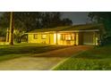 Night view of single-story home with driveway at 2114 N Hastings St, Orlando, FL 32808