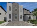 Modern house exterior with stone accents at 2933 Fable St, Kissimmee, FL 34746