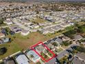 Aerial view showing home's location in a residential neighborhood at 2881 Kokomo Loop, Haines City, FL 33844
