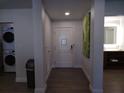Bright entryway with wood-look floors at 14501 Grove Resort Ave # 2211, Winter Garden, FL 34787