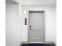 Modern apartment entry door with keyless lock at 14501 Grove Resort Ave # 3327, Winter Garden, FL 34787