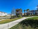 Two-story house on a tree-lined street in a residential neighborhood at 728 Costa Ln, Debary, FL 32713
