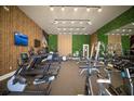 Fitness center with modern equipment and wood decor at 3062 Rockefeller Way, Kissimmee, FL 34747