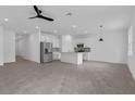 Modern kitchen with island and stainless steel appliances at 2872 Lingo Ln, Orlando, FL 32822