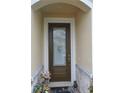 Inviting front door with decorative glass and welcoming mat at 4904 Blanche Ct, Saint Cloud, FL 34772