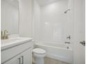 Clean bathroom with white vanity, bathtub, and shower at 2067 Rainier Dr, Kissimmee, FL 34746