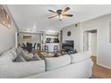 Open living room, dining, and kitchen at 5566 Metrowest Blvd # 104, Orlando, FL 32811