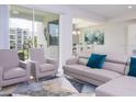 Spacious living room with comfortable seating and large windows at 3180 Paradox Circle # 203, Kissimmee, FL 34746