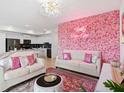 Open concept living space with a kitchen and chic decor at 3191 Paradox Cir # 202, Kissimmee, FL 34746