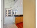 Modern kitchen with granite countertops and hardwood floors at 155 S Court Ave # 1704, Orlando, FL 32801
