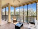 Cozy screened balcony overlooking a tranquil lake at 9055 Treasure Trove Ln # 204, Kissimmee, FL 34747