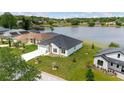 Aerial view of lakefront home at 10625 Summit Lakes Ln, Clermont, FL 34711