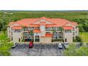 Condo building showcasing a desirable waterfront location at 466 Bouchelle Dr # 202, New Smyrna Beach, FL 32169