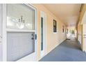 Building hallway with access to condo unit 202 at 466 Bouchelle Dr # 202, New Smyrna Beach, FL 32169