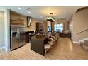 Modern kitchen with stainless steel appliances and island at 7484 Brooklyn Dr, Kissimmee, FL 34747