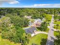 Bird's-eye view of a house, pool, and surrounding neighborhood at 3130 Willow Oak Dr, Edgewater, FL 32141