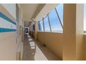 Building hallway with tiled floors and ocean view at 701 S Atlantic Ave # 508, Daytona Beach, FL 32118