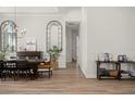 Spacious dining area with hardwood floors and access to other rooms at 858 Creston Dr, Maitland, FL 32751