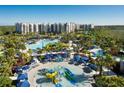 Aerial view of resort-style pool with waterslides at 14501 Grove Resort Ave # 3438, Winter Garden, FL 34787