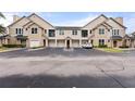 Two story townhome with three-car garage and a spacious driveway at 2045 Erving Cir # 101, Ocoee, FL 34761