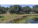 Aerial of house and surrounding lakefront property at 4790 Anderson Rd, Orlando, FL 32812