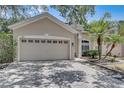 Two-car garage home with a nicely landscaped yard at 2938 Daybreak Dr, Orlando, FL 32825