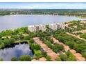 Aerial view of community near lake at 6312 Buford St # 303, Orlando, FL 32835
