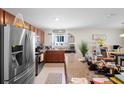 Large kitchen island and stainless steel appliances at 2862 Mosshire Cir, Saint Cloud, FL 34772