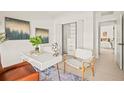 Bright home office with built-in shelving and stylish furnishings at 6368 Chorus Dr, Mascotte, FL 34753