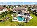 Luxury home with a large pool, spa, and outdoor entertainment area at 4029 Isabella Cir, Windermere, FL 34786