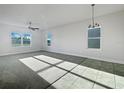 Bright living room with carpet and tile floors at 3690 Sagefield Dr, St Cloud, FL 34773