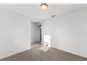 Spacious bedroom featuring a large closet and neutral wall colors at 2466 Leeds St, Haines City, FL 33844