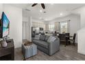 Open living area with kitchen, featuring a comfortable couch and dining area at 2956 Salted Rim Rd, Kissimmee, FL 34747