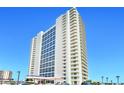 A tall white building with many windows and balconies at 2545 S Atlantic Ave # 2107-2108, Daytona Beach Shores, FL 32118