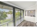 Bright living room with water views and sliding glass doors at 200 Maitland Ave # 174, Altamonte Springs, FL 32701
