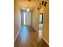 Bright entryway with tile flooring and neutral colors at 17926 Hither Hills Cir, Winter Garden, FL 34787