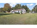Cute bungalow with a spacious yard and mature trees at 2805 Nw 4Th Ave, Ocala, FL 34475