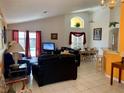 Open living area with a view of the pool and dining area at 452 Paloma Dr, Davenport, FL 33837