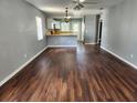 Large living room with dark brown wood flooring at 645 W 6Th St, Lakeland, FL 33805