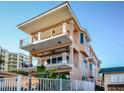Three-story beach house with balconies and ocean views at 0 S Atlantic Ave, New Smyrna Beach, FL 32169