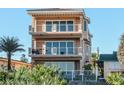 Three-story beach house with multiple balconies and ocean views at 0 S Atlantic Ave, New Smyrna Beach, FL 32169