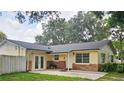 Ranch style home with brick and vinyl siding at 4210 Dorwood Dr, Orlando, FL 32818